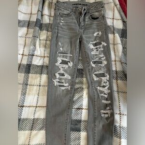 American eagle high waisted, skinny jeans patched rips